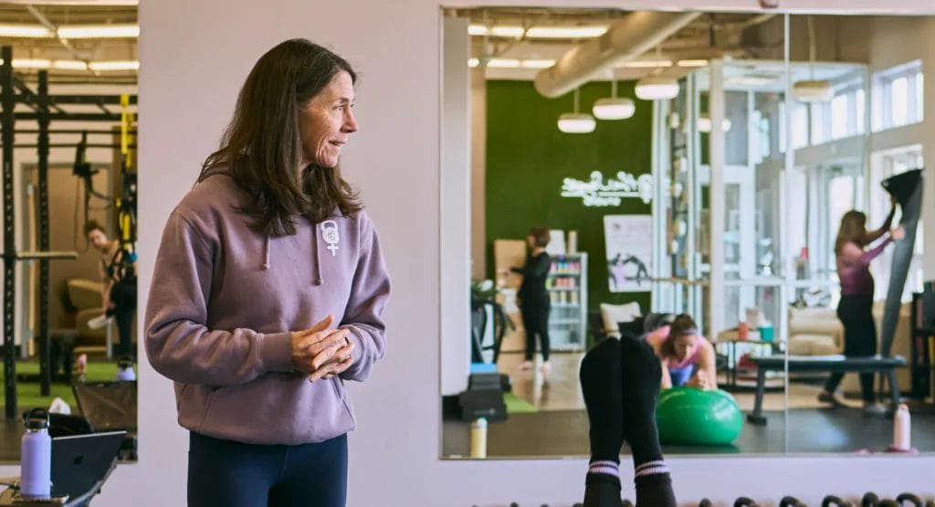 Coach watching members at Her Strength Studio